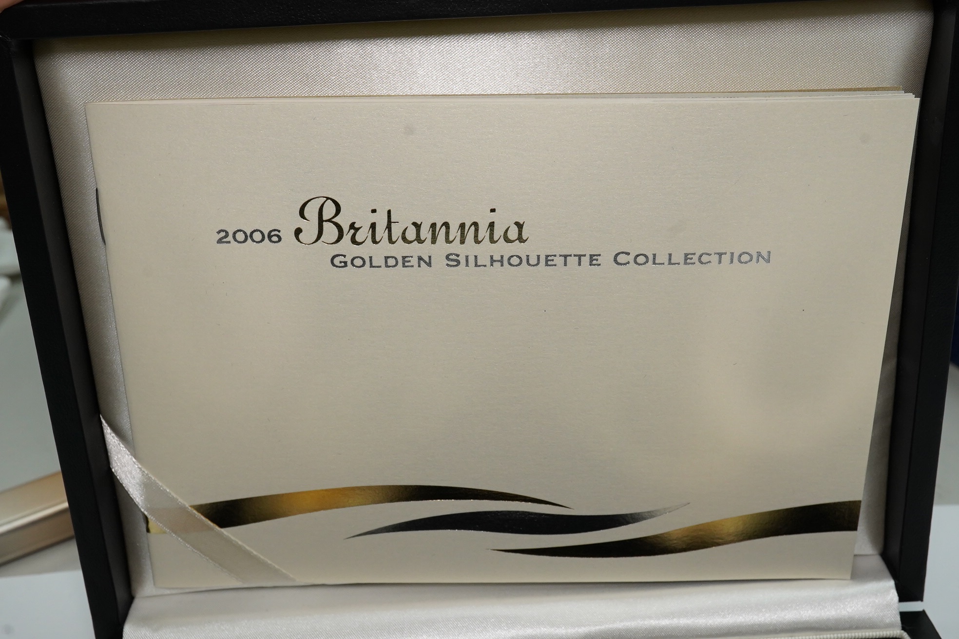 Royal Mint UK QEII coins, 2006 Britannia golden silhouette collection, a set of five proof silver and parcel gilt 1oz. Britannia coins, in case of issue with certificate